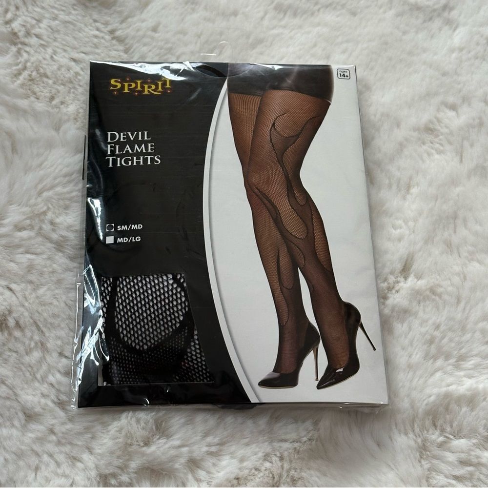 New in packaging Spirit Halloween fishnet devil flame tights